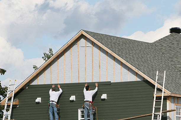 Professional Siding technician working in Elkwood, VA